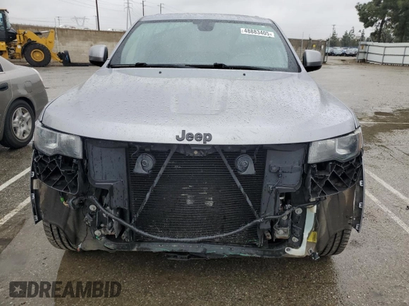 2018 Jeep Grand Cherokee Laredo с VIN 1C4RJFAG8JC367974, выставлен на аукционе Copart как лот 48883405 с пробегом 99 311 миль миль и Списание • Salvage title. История ставок и продаж доступна на DreamBid. Изображение 5.
