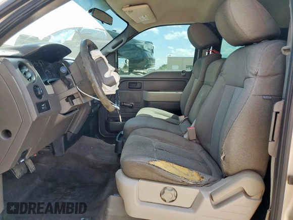 2009 Ford F-150 STX with VIN 1FTRX12W79KC78227, listed as a Copart auction lot 62272975 with 189,516 mi miles and Salvage title. Bid and sale history available at DreamBid. Image 7.