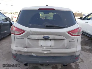 2014 Ford Escape SE with VIN 1FMCU0GX8EUB31399, listed as a IAAI auction lot 41795927 with 129,963 mi miles. Bid and sale history available at carsss.com. Image 16.