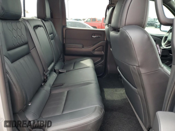 2022 Nissan Frontier SV z VIN 1N6ED1EK5NN631411, wystawiony jako Copart lot #57287645 z przebiegiem 25 027 mil mil oraz Szkoda całkowita • Salvage title. Historia ofert i sprzedaży dostępna na DreamBid. Obrazek 10.