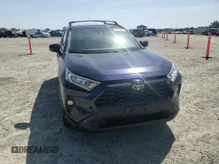2020 Toyota RAV4 XLE with VIN 2T3W1RFV2LW074325, listed as a Copart auction lot 58693665 with 34,830 mi miles and Salvage title. Bid and sale history available at DreamBid. Image 14.