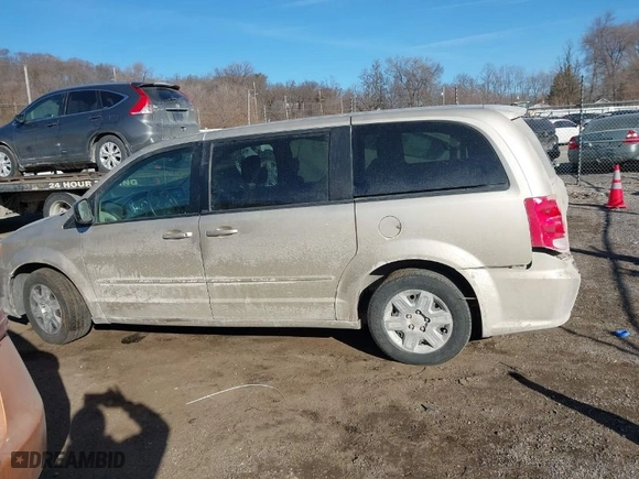 2012 Dodge Grand Caravan SE with VIN 2C4RDGBG0CR419538, listed as a IAAI auction lot 41440643 with 144,678 mi miles. Bid and sale history available at carsss.com. Image 14.