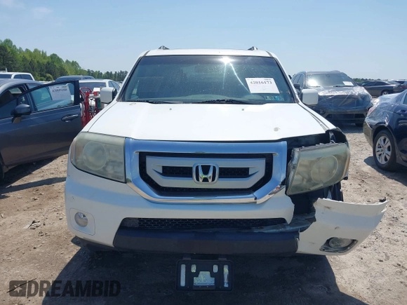 2009 Honda Pilot EX-L with VIN 5FNYF48619B022699, listed as a IAAI auction lot 42016173 with 204,190 mi miles and . Bid and sale history available at carsss.com. Image 12.