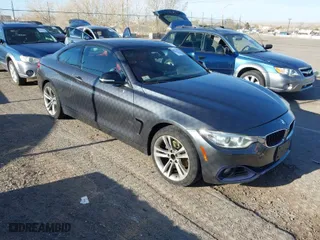 2015 BMW 4 Series 428i xDrive with VIN WBA3N5C58FK484738, listed as a IAAI auction lot 41772870 with 175,510 mi miles. Bid and sale history available at carsss.com. Image 1.
