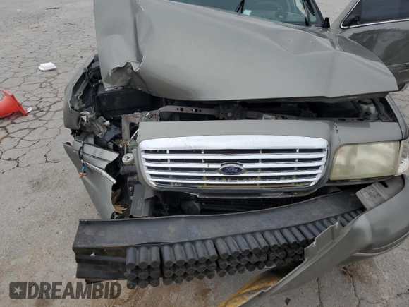 2003 Ford Police Interceptor Street Appear with VIN 2FAFP71W83X132646, listed as a Copart auction lot 55864205 with 211,073 mi miles and Salvage title. Bid and sale history available at DreamBid. Image 11.