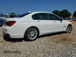 2013 BMW 7 Series 750Li with VIN WBAYE8C56DD132217, listed as a Copart auction lot 61976145 with 146,860 mi miles and Salvage title. Bid and sale history available at DreamBid. Image 3.