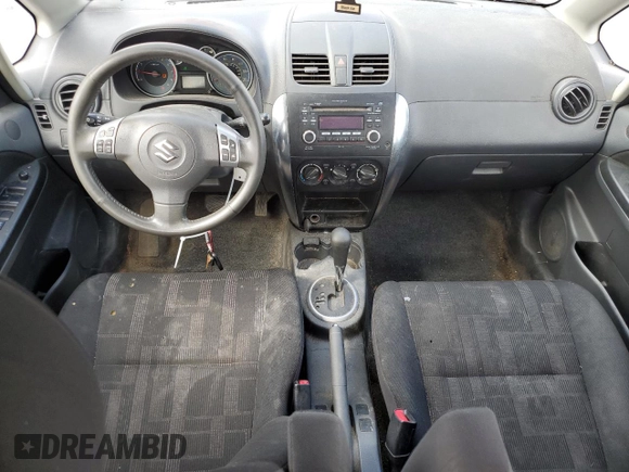 2012 Suzuki SX4 LE with VIN JS2YC5A34C6300079, listed as a Copart auction lot 68414434 with 111,661 mi miles and Salvage Title. Bid and sale history available at carsss.com. Image 8.