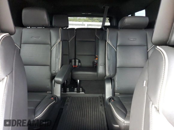 2021 Cadillac Escalade z VIN 1GYS3PKL6MR288828, wystawiony jako Copart lot #78219414 z przebiegiem 22 362 mil mil oraz Czysty tytuł • Clean title. Historia ofert i sprzedaży dostępna na DreamBid. Obrazek 10.