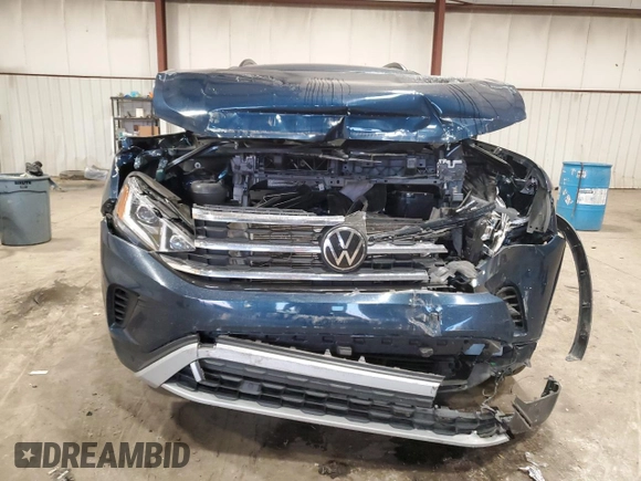2023 Volkswagen Atlas SE with VIN 1V2KP2CA0PC546924, listed as a Copart auction lot 77533534 with 47,127 mi miles and Salvage title. Bid and sale history available at DreamBid. Image 5.