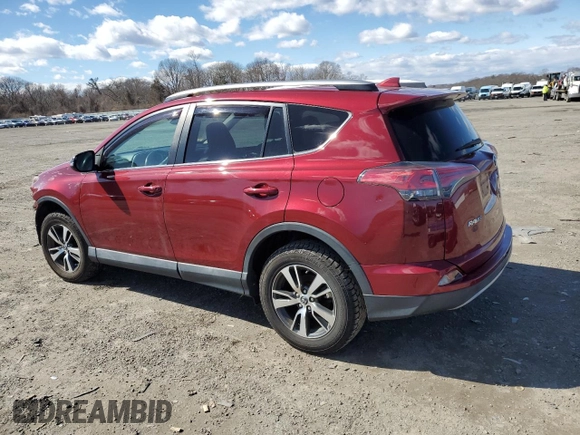 2018 Toyota RAV4 XLE with VIN 2T3RFREVXJW715931, listed as a Copart auction lot 48130715 with 106,324 mi miles and Salvage Title. Bid and sale history available at DreamBid. Image 2.