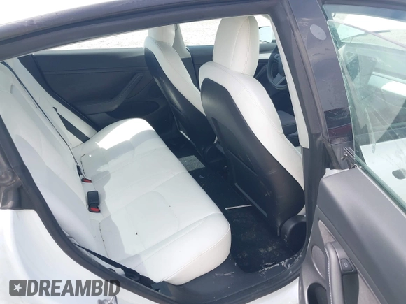 2022 Tesla Model 3 Long Range z VIN 5YJ3E1EB4NF165427, wystawiony jako IAAI lot #42290413 z przebiegiem 73 493 mil mil oraz . Historia ofert i sprzedaży dostępna na DreamBid. Obrazek 8.