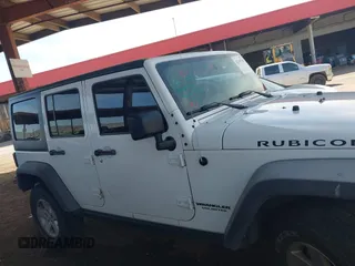 2015 Jeep Wrangler Unlimited Rubicon with VIN 1C4BJWFG9FL744927, listed as a IAAI auction lot 42169740 with 106,352 mi miles and . Bid and sale history available at DreamBid. Image 14.