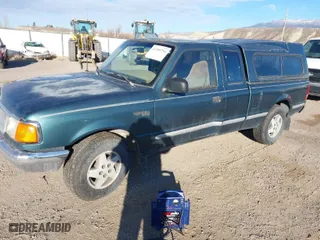 1996 Ford Ranger XLT with VIN 1FTCR14X2TPA35148, listed as a IAAI auction lot 41309294 with 244,549 mi miles. Bid and sale history available at carsss.com. Image 2.