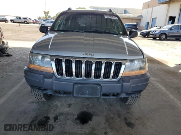 2003 Jeep Grand Cherokee Laredo with VIN 1J4GW48S23C617830, listed as a Copart auction lot 57481565 with 122,745 mi miles and Salvage title. Bid and sale history available at DreamBid. Image 5.