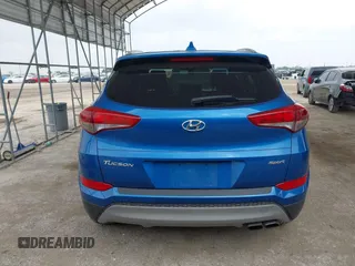 2018 Hyundai Tucson Sport with VIN KM8J33AL0JU803368, listed as a IAAI auction lot 41937235 with 64,163 mi miles and . Bid and sale history available at DreamBid. Image 17.