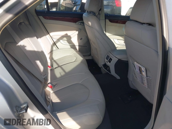 2010 Cadillac CTS Luxury with VIN 1G6DE5EG9A0144317, listed as a IAAI auction lot 42093890 with 70,099 mi miles. Bid and sale history available at carsss.com. Image 8.