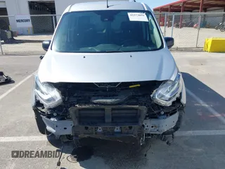 2019 Ford Transit Connect XLT z VIN NM0LS7F25K1427581, wystawiony jako IAAI lot #42373059 z przebiegiem 103 727 mil mil oraz . Historia ofert i sprzedaży dostępna na DreamBid. Obrazek 13.