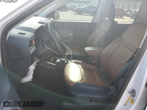2023 Ford Maverick XL with VIN 3FTTW8E37PRB01270, listed as a Copart auction lot 50803335 with 16,996 mi miles and Salvage Title. Bid and sale history available at DreamBid. Image 7.