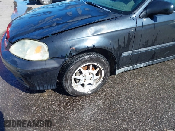1999 Honda Civic HX with VIN 1HGEJ7123XL068508, listed as a IAAI auction lot 41803733 with 191,412 mi miles. Bid and sale history available at carsss.com. Image 6.