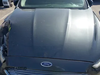 2015 Ford Fusion SE Hybrid with VIN 3FA6P0LU4FR306928, listed as a IAAI auction lot 41826720 with 83,983 mi miles. Bid and sale history available at carsss.com. Image 10.