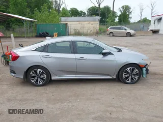 2016 Honda Civic EX-L with VIN 2HGFC1F71GH636929, listed as a IAAI auction lot 42253766 with 123,612 mi miles and . Bid and sale history available at DreamBid. Image 14.