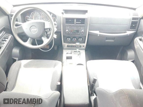 2010 Jeep Liberty Sport with VIN 1J4PN2GK3AW143682, listed as a Copart auction lot 54299555 with 137,257 mi miles and Salvage Title. Bid and sale history available at DreamBid. Image 8.