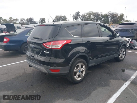 2013 Ford Escape SE with VIN 1FMCU0GX8DUC47099, listed as a IAAI auction lot 42573987 with 142,779 mi miles and . Bid and sale history available at DreamBid. Image 4.