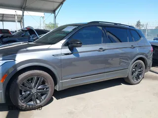 2022 Volkswagen Tiguan SE R-Line Black with VIN 3VVCB7AX8NM039730, listed as a IAAI auction lot 42313651 with 71,759 mi miles and . Bid and sale history available at DreamBid. Image 15.