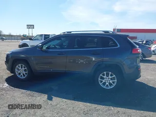 2017 Jeep Cherokee Latitude with VIN 1C4PJLCBXHW572714, listed as a IAAI auction lot 41861087 with 120,552 mi miles and . Bid and sale history available at DreamBid. Image 14.
