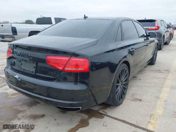 2013 Audi A8 L 4.0L with VIN WAUR2AFDXDN017895, listed as a IAAI auction lot 41609142 with 104,744 mi miles. Bid and sale history available at carsss.com. Image 4.