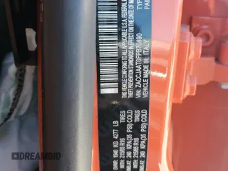2015 Jeep Renegade Sport z VIN ZACCJAAT0FPB70490, wystawiony jako Copart lot #49582425 z przebiegiem 89 634 mil mil oraz Szkody całkowita. Historia ofert i sprzedaży dostępna na DreamBid. Obrazek 14.