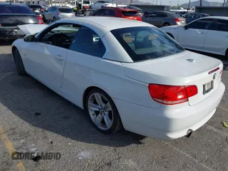 2007 BMW 3 Series 335i with VIN WBAWL73547PX47052, listed as a IAAI auction lot 41700828 with 64,409 mi miles. Bid and sale history available at carsss.com. Image 3.