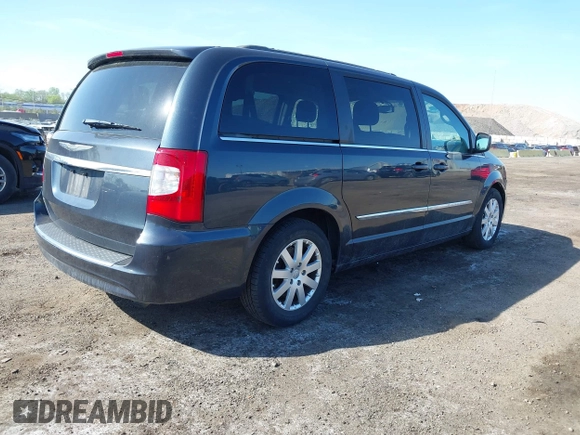 2014 Chrysler Town & Country Touring with VIN 2C4RC1BG7ER132197, listed as a IAAI auction lot 42153347 with 72,399 mi miles. Bid and sale history available at carsss.com. Image 4.