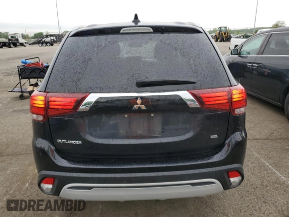 2020 Mitsubishi Outlander SE with VIN JA4AD3A35LZ030379, listed as a Copart auction lot 55917925 with 104,748 mi miles and Salvage title. Bid and sale history available at DreamBid. Image 6.