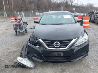 2016 Nissan Altima SV with VIN 1N4AL3AP0GC225851, listed as a IAAI auction lot 41662946 with 119,033 mi miles and . Bid and sale history available at DreamBid. Image 12.