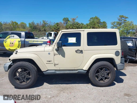 2011 Jeep Wrangler Sahara with VIN 1J4AA5D13BL562732, listed as a IAAI auction lot 41838520 with 148,359 mi miles and . Bid and sale history available at DreamBid. Image 15.