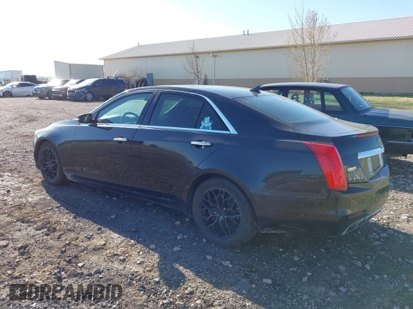 2014 Cadillac CTS Luxury AWD z VIN 1G6AX5SX9E0177017, wystawiony jako IAAI lot #42038429 z przebiegiem 113 656 mil mil oraz . Historia ofert i sprzedaży dostępna na DreamBid. Obrazek 3.