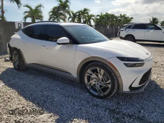 2023 Genesis GV60 Performance with VIN KMUKEDTB6PU017545, listed as a Copart auction lot 74197374 with 9,089 mi miles and Salvage Title. Bid and sale history available at carsss.com. Image 4.