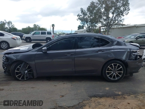 2019 Acura TLX with VIN 19UUB2F39KA009156, listed as a IAAI auction lot 41777615 with 111,540 mi miles and . Bid and sale history available at DreamBid. Image 14.