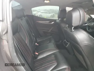 2016 Maserati Ghibli z VIN ZAM57XSA7G1168458, wystawiony jako Copart lot #43611465 z przebiegiem 98 110 mil mil oraz Szkody całkowita. Historia ofert i sprzedaży dostępna na DreamBid. Obrazek 10.