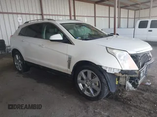 2010 Cadillac SRX Premium Collection z VIN 3GYFNCEY8AS577231, wystawiony jako IAAI lot #42004015 z przebiegiem 134 900 mil mil oraz . Historia ofert i sprzedaży dostępna na DreamBid. Obrazek 1.
