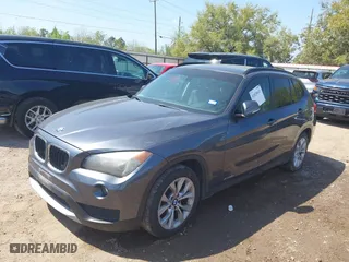 2014 BMW X1 xDrive28i with VIN WBAVL1C52EVY13471, listed as a IAAI auction lot 41828415 with 1 mi miles. Bid and sale history available at carsss.com. Image 2.