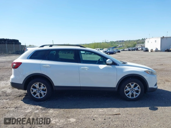 2015 Mazda CX-9 Touring with VIN JM3TB3CV1F0461403, listed as a IAAI auction lot 42148325 with 143,452 mi miles. Bid and sale history available at carsss.com. Image 13.