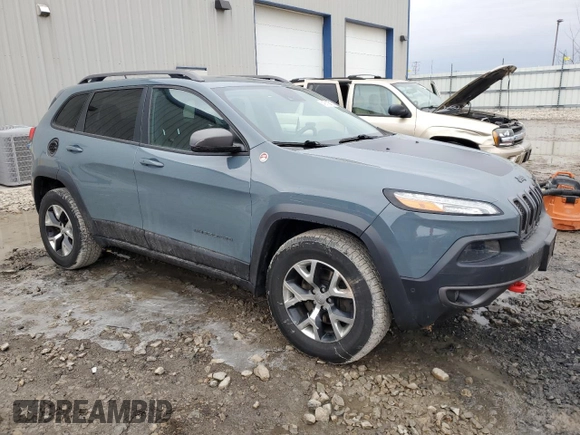 2014 Jeep Cherokee Trailhawk with VIN 1C4PJMBB9EW251749, listed as a Copart auction lot 49712915 with 94,289 mi miles and Clean Title. Bid and sale history available at carsss.com. Image 4.