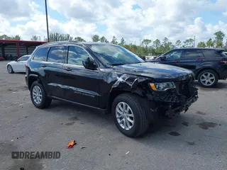 2021 Jeep Grand Cherokee Laredo X with VIN 1C4RJEAG5MC843953, listed as a IAAI auction lot 41558914 with 28,188 mi miles. Bid and sale history available at carsss.com. Image 1.