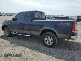 2003 Ford F-150 XL with VIN 1FTRX18L73NB65607, listed as a Copart auction lot 55025085 with 241,434 mi miles and Salvage title. Bid and sale history available at DreamBid. Image 2.