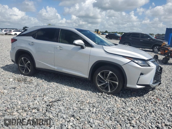 2019 Lexus RX 350 with VIN 2T2ZZMCAXKC135144, listed as a Copart auction lot 65119585 with 61,138 mi miles and Salvage title. Bid and sale history available at DreamBid. Image 4.