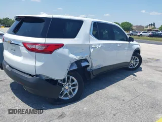 2021 Chevrolet Traverse LS with VIN 1GNERFKWXMJ201136, listed as a IAAI auction lot 42254422 with 50,663 mi miles and . Bid and sale history available at DreamBid. Image 4.
