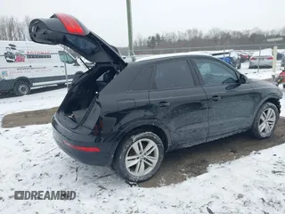 2017 Audi Q3 Premium with VIN WA1BCCFSXHR012345, listed as a IAAI auction lot 41589844 with 125,044 mi miles and . Bid and sale history available at DreamBid. Image 4.