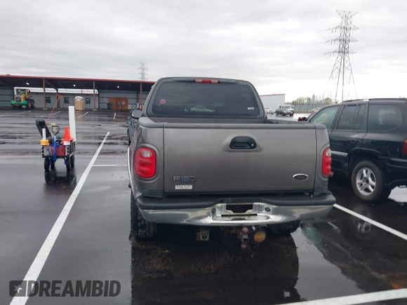 2003 Ford F-150 XLT with VIN 1FTRW08L43KD25506, listed as a IAAI auction lot 41941847 with 1 mi miles. Bid and sale history available at carsss.com. Image 16.